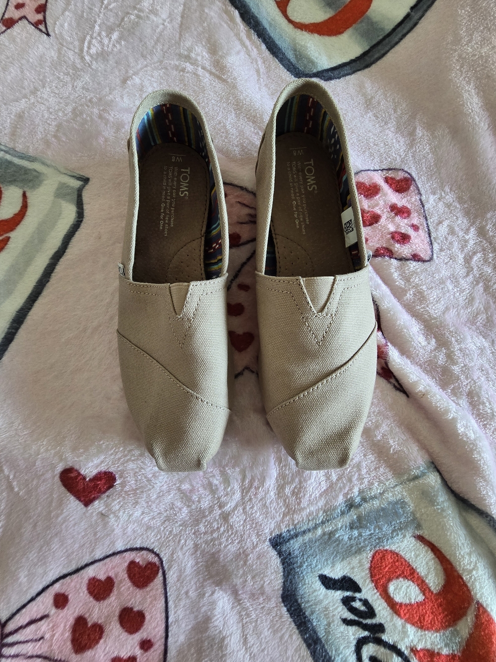 TOMS Classic Canvas Slip-Ons in Light Beige